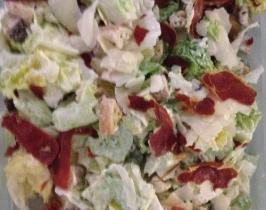 Caesar salad with large shavings of Grana Padano, oven dried prosciutto  and homemade Caesar dressing 