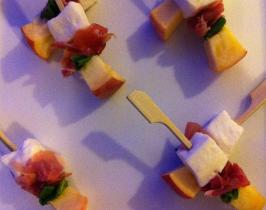 •	Tiny bamboo skewers of buffalo mozzarella, peach, mint and prosciutto